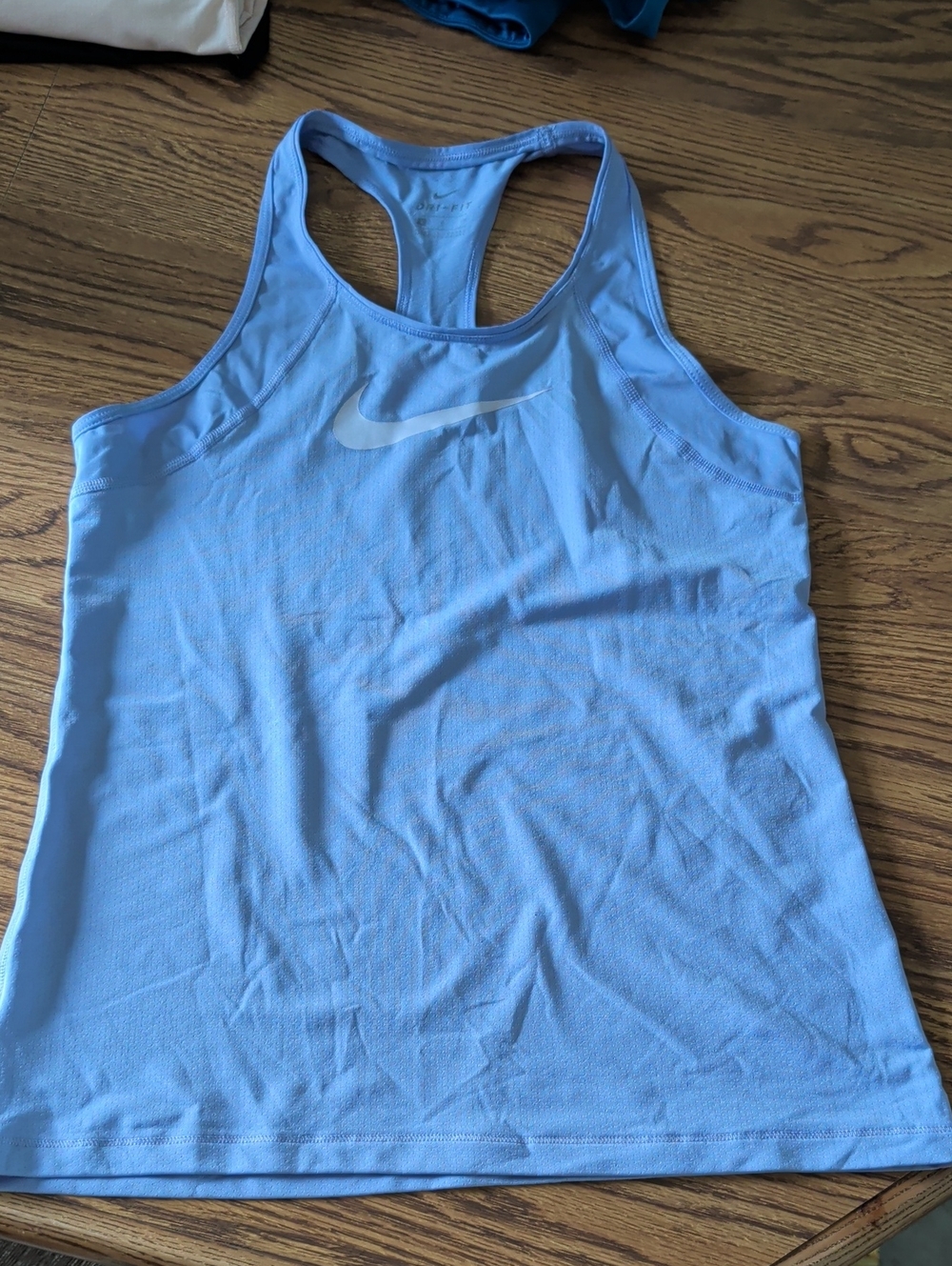 Women's Nike Light Purple Racerback Tank with White Swoosh